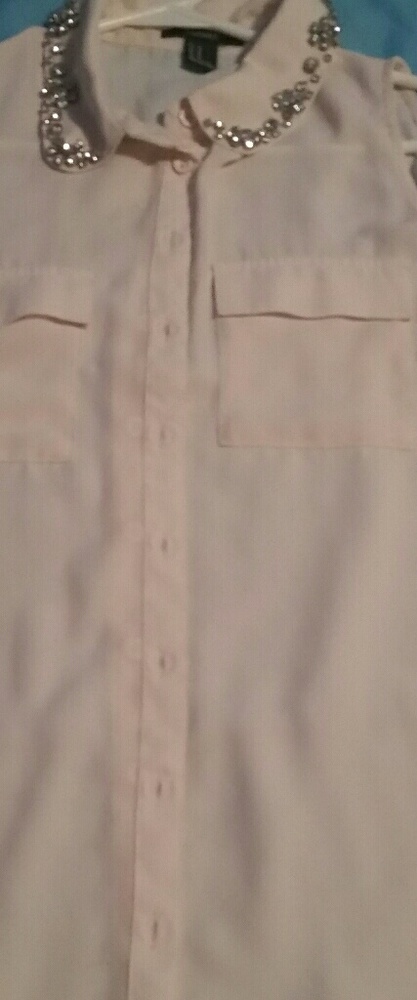 White sleeveless top with rhinestone neckline